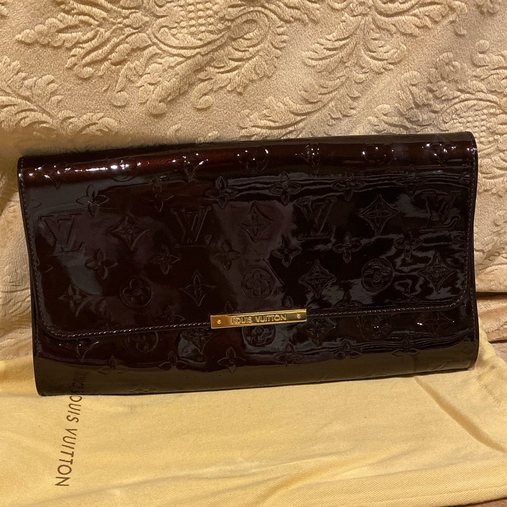 Eggplant clutch and LV shoes size 8